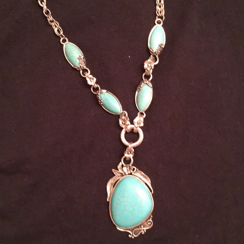 Gorgeous silver and turquoise color boho necklace.